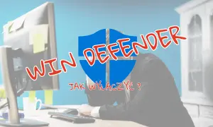 Zrezygnowany pracownik przed monitorem, nad nim logo Windows Defender i pytanie: jak wyłączyć Windows Defender?